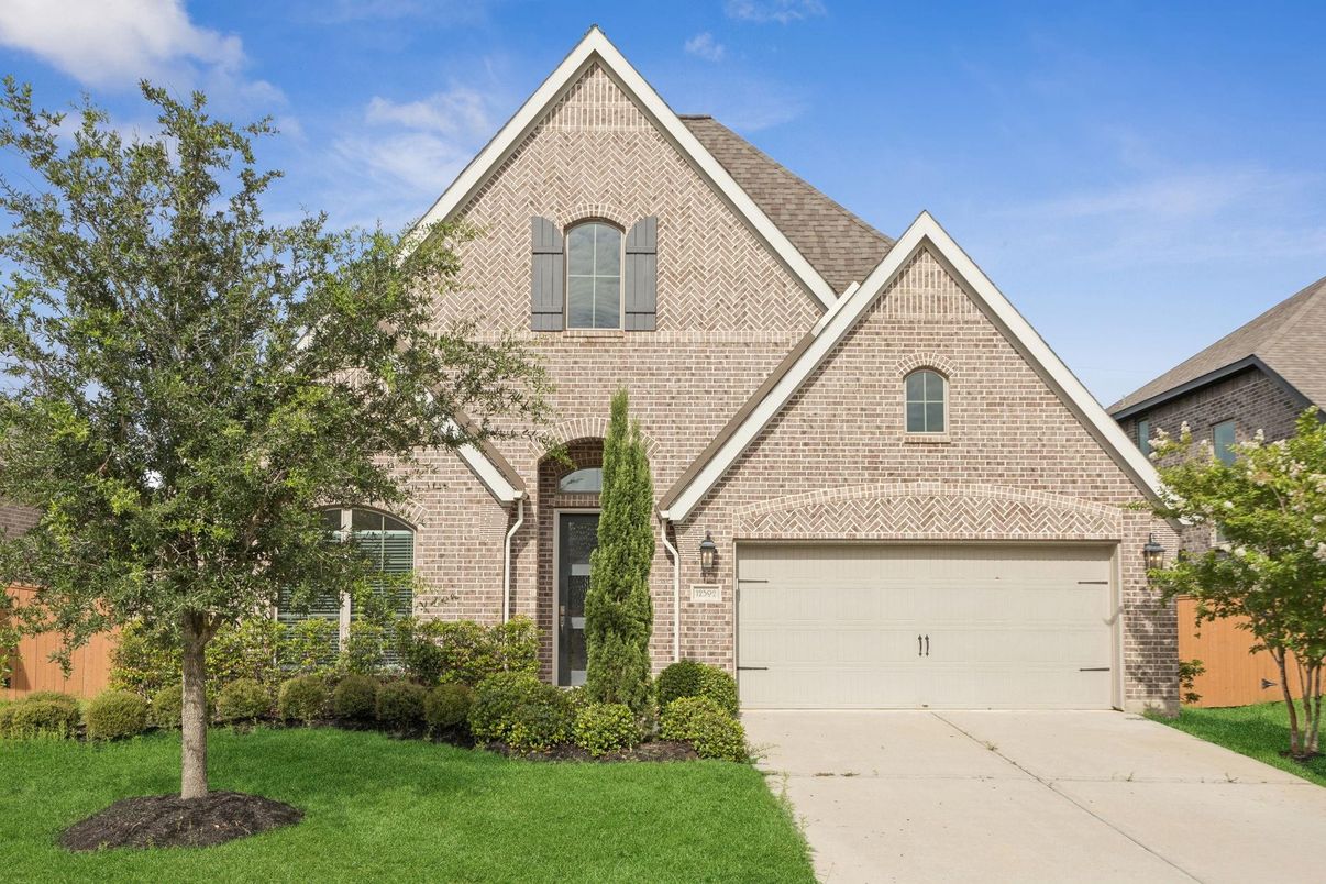 Attached, Exterior, Facade, Brick Facade, Brick Traditional