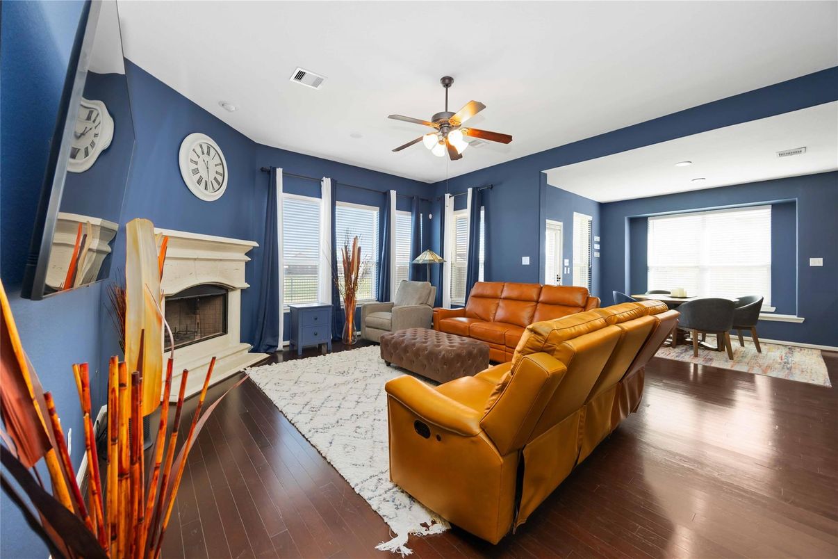 Dining room, Fireplace, Interior, Living room, Recessed Lighting, Wood Texture Flooring