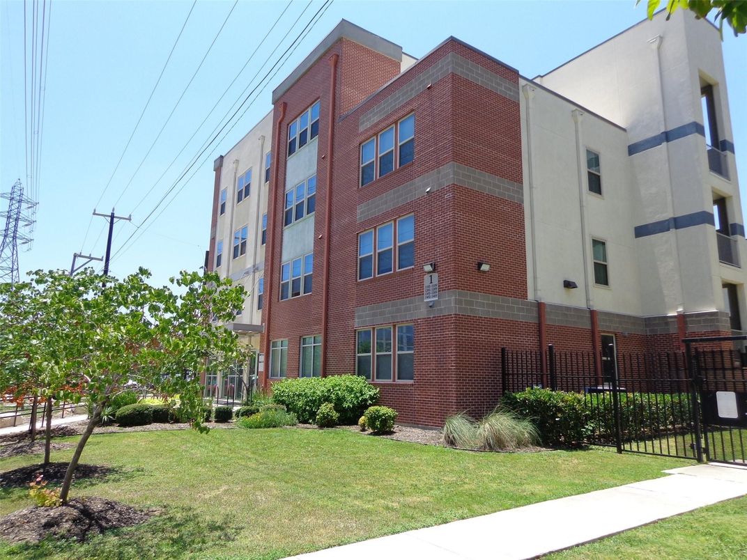 Exterior, Facade, Brick Facade, Condo Building