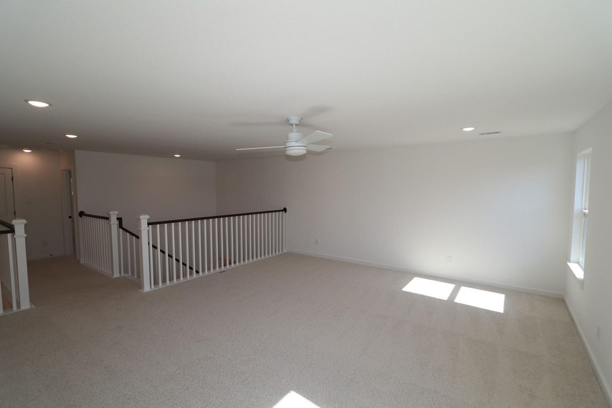 Dining room, Fireplace, Interior, Living room, Recessed Lighting, Wood Texture Flooring