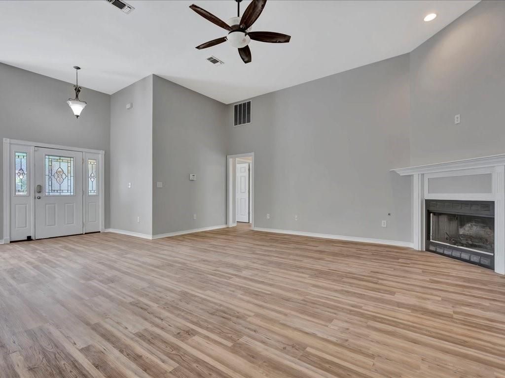 Empty room, Fireplace, Interior, Pendant Lights, Recessed Lighting, Wood Texture Flooring