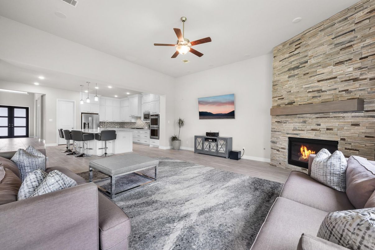 Fireplace, Interior, Kitchen, Living room, Pendant Lights, Recessed Lighting, Stainless Steel Appliances, Stone Walls, Wood Texture Flooring, Wooden Walls