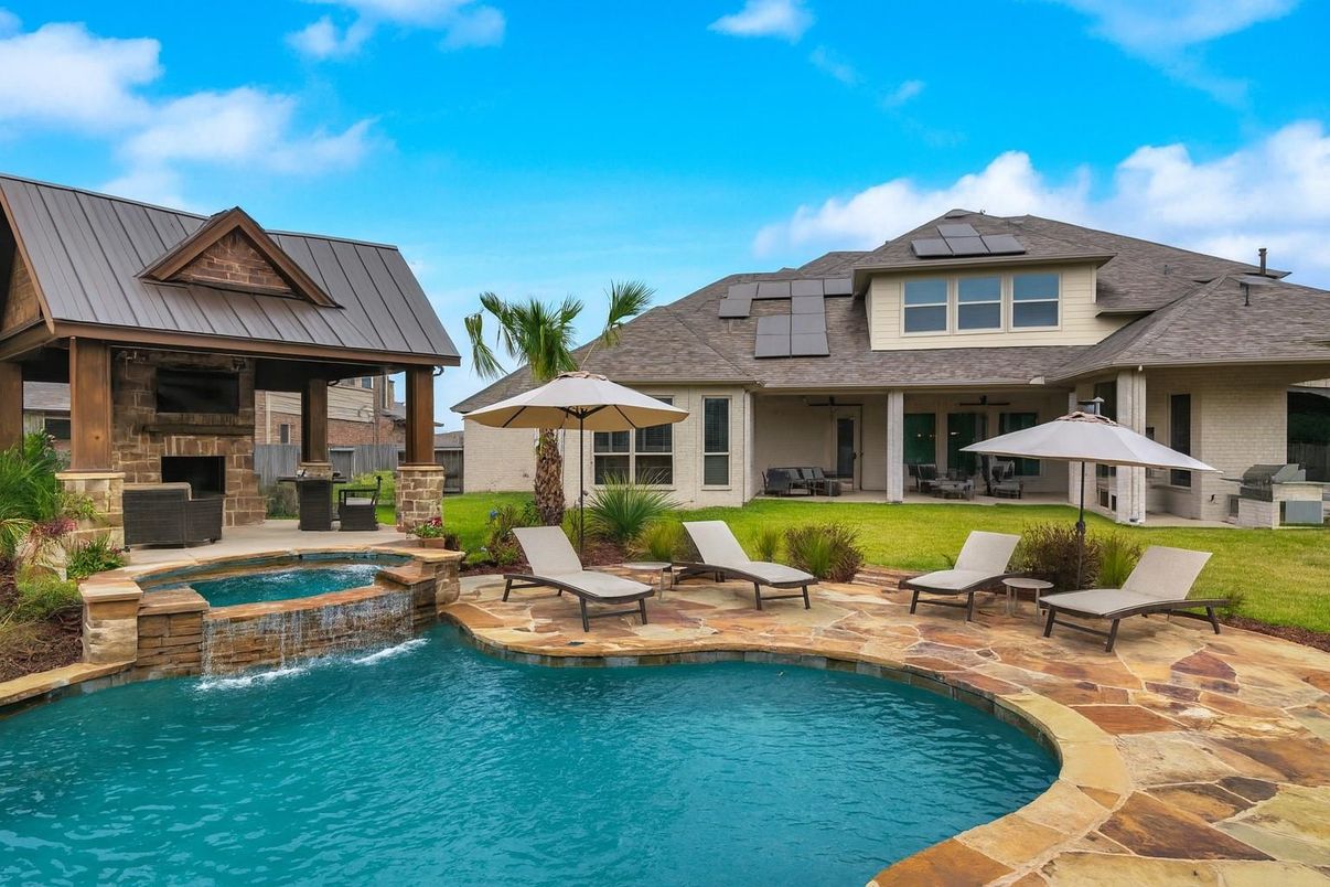 Exterior, Pool, Solar Panels
