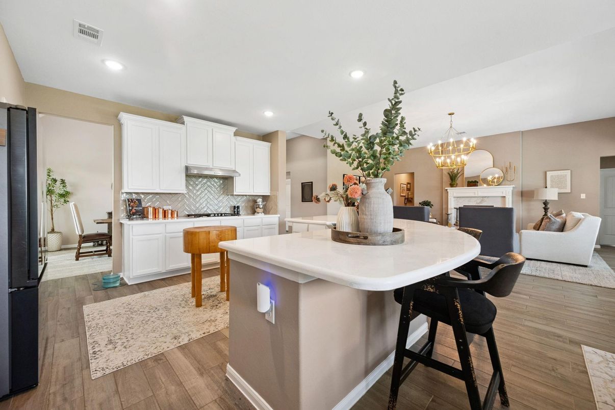 Chandelier, Dining room, Fireplace, Interior, Kitchen, Living room, Recessed Lighting, Wood Texture Flooring