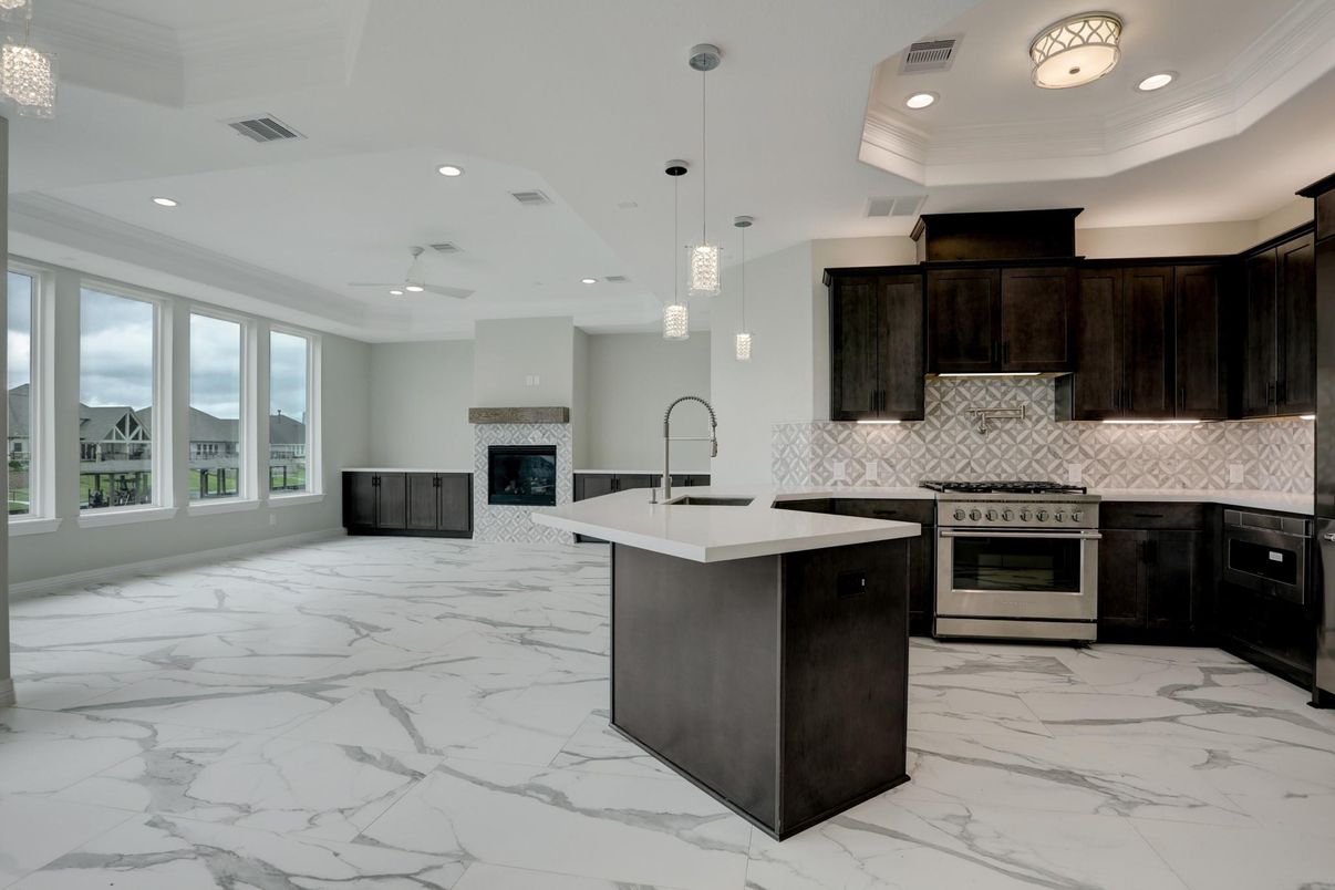 Fireplace, Interior, Kitchen, Marble, Pendant Lights, Recessed Lighting, Stainless Steel Appliances