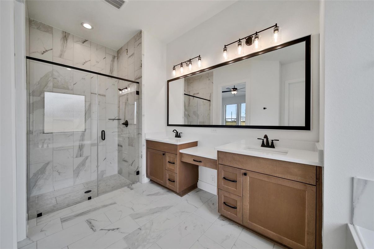 Bathroom, Dual Sink Vanities, Glass Shower, Interior, Marble, Marble Walls, Recessed Lighting