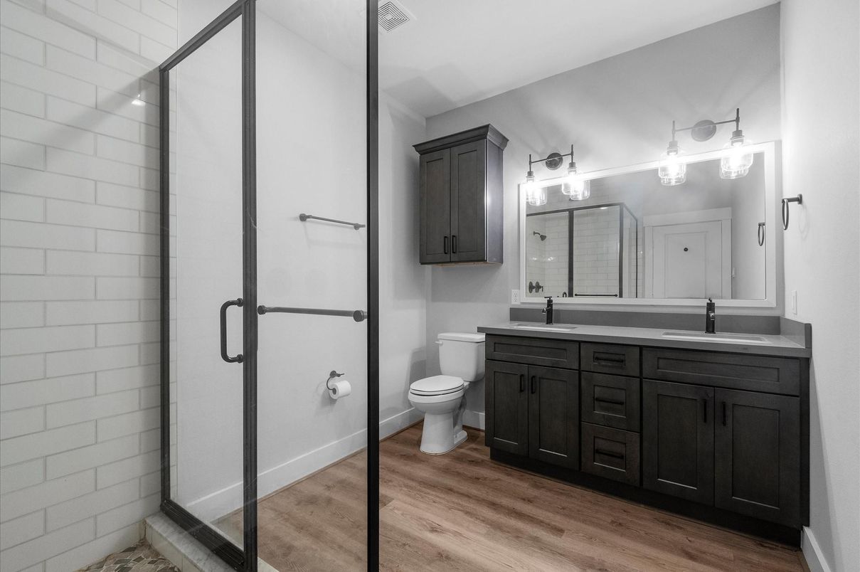 Bathroom, Dual Sink Vanities, Glass Shower, Interior, Wood Texture Flooring
