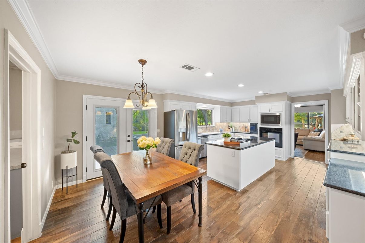Dining room, Interior, Kitchen, Living room, Pendant Lights, Recessed Lighting, Stainless Steel Appliances, Wood Texture Flooring