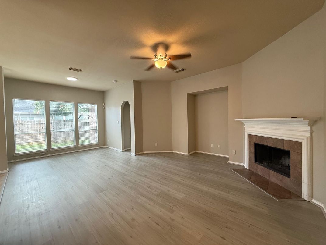 Empty room, Fireplace, Interior, Recessed Lighting, Wood Texture Flooring
