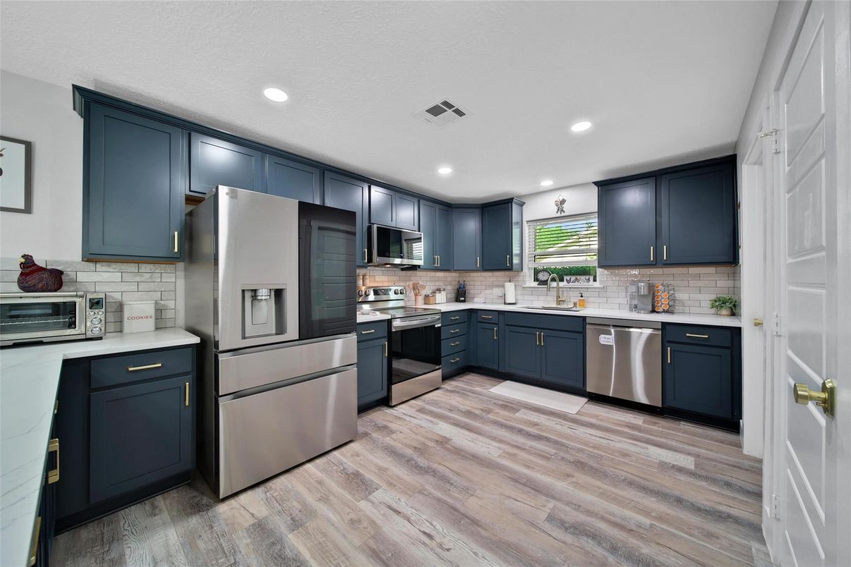 Interior, Kitchen, Recessed Lighting, Stainless Steel Appliances, Wood Texture Flooring