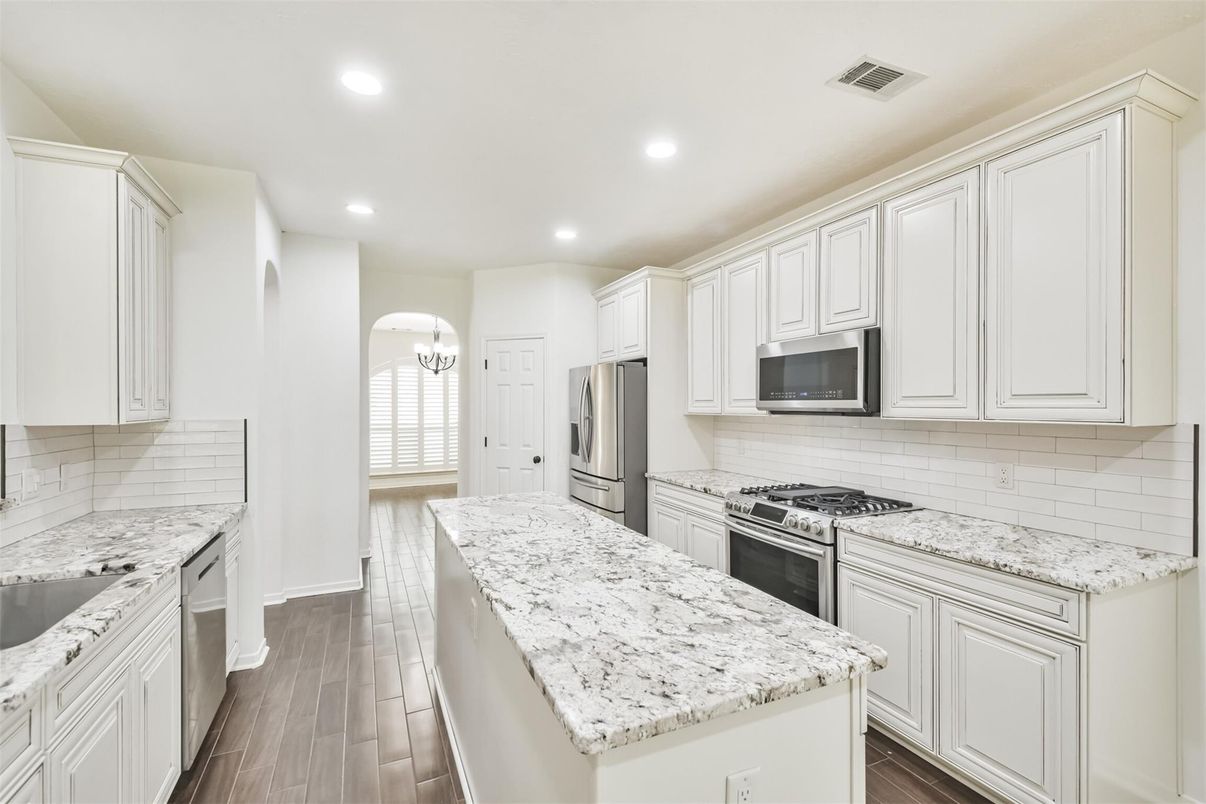 Chandelier, Interior, Kitchen, Recessed Lighting, Stainless Steel Appliances, Wood Texture Flooring