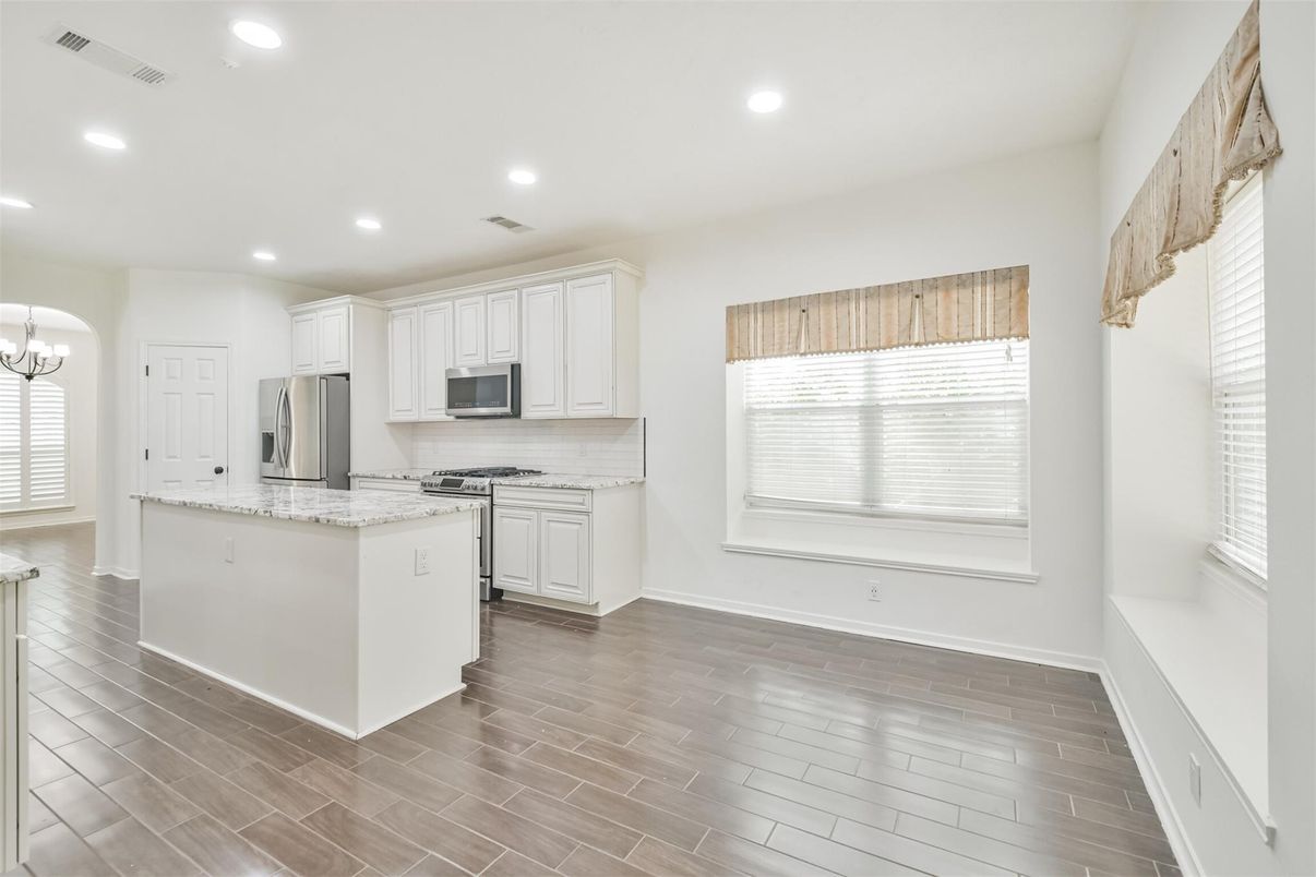 Interior, Kitchen, Recessed Lighting, Stainless Steel Appliances, Wood Texture Flooring