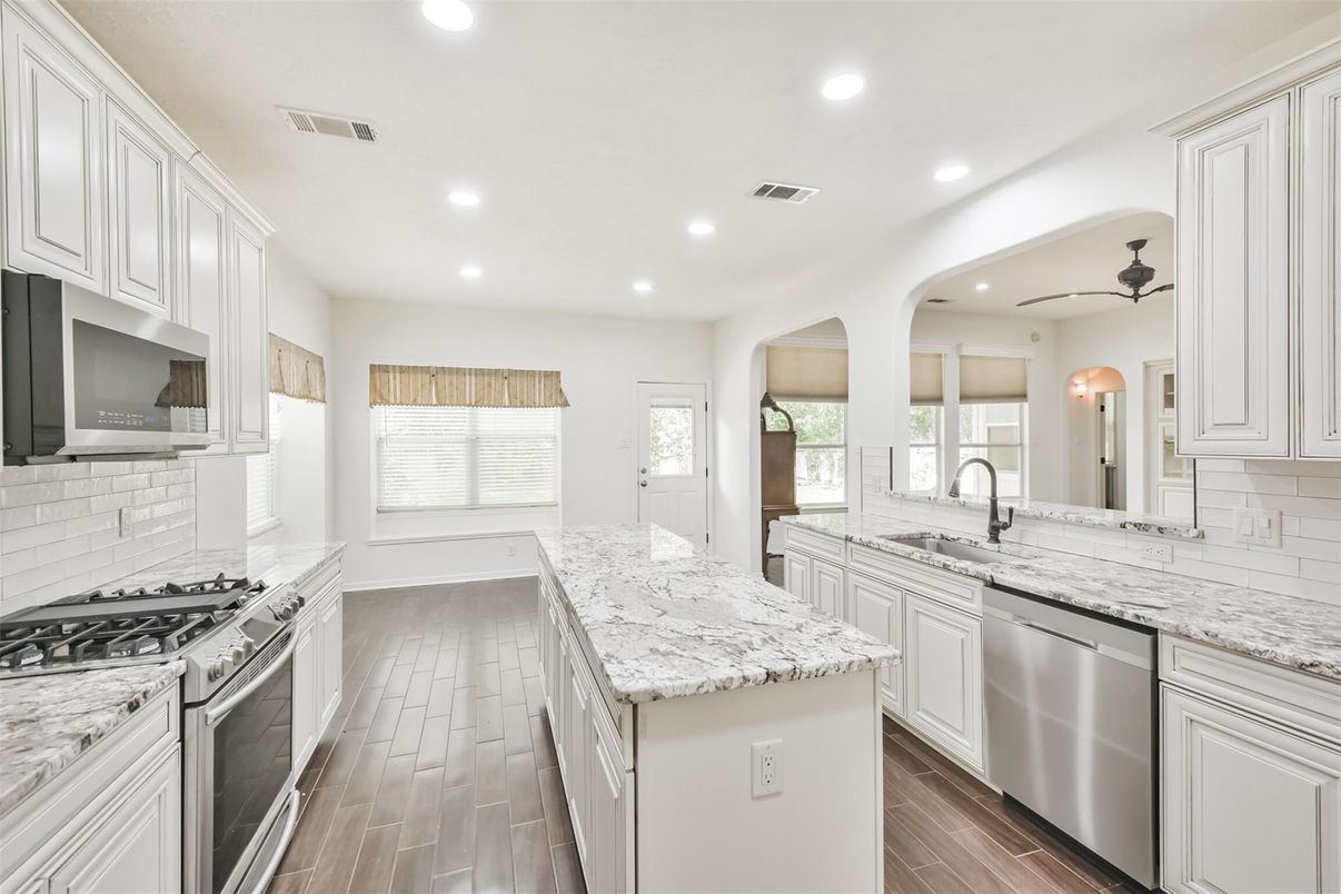 Interior, Kitchen, Recessed Lighting, Stainless Steel Appliances, Wood Texture Flooring
