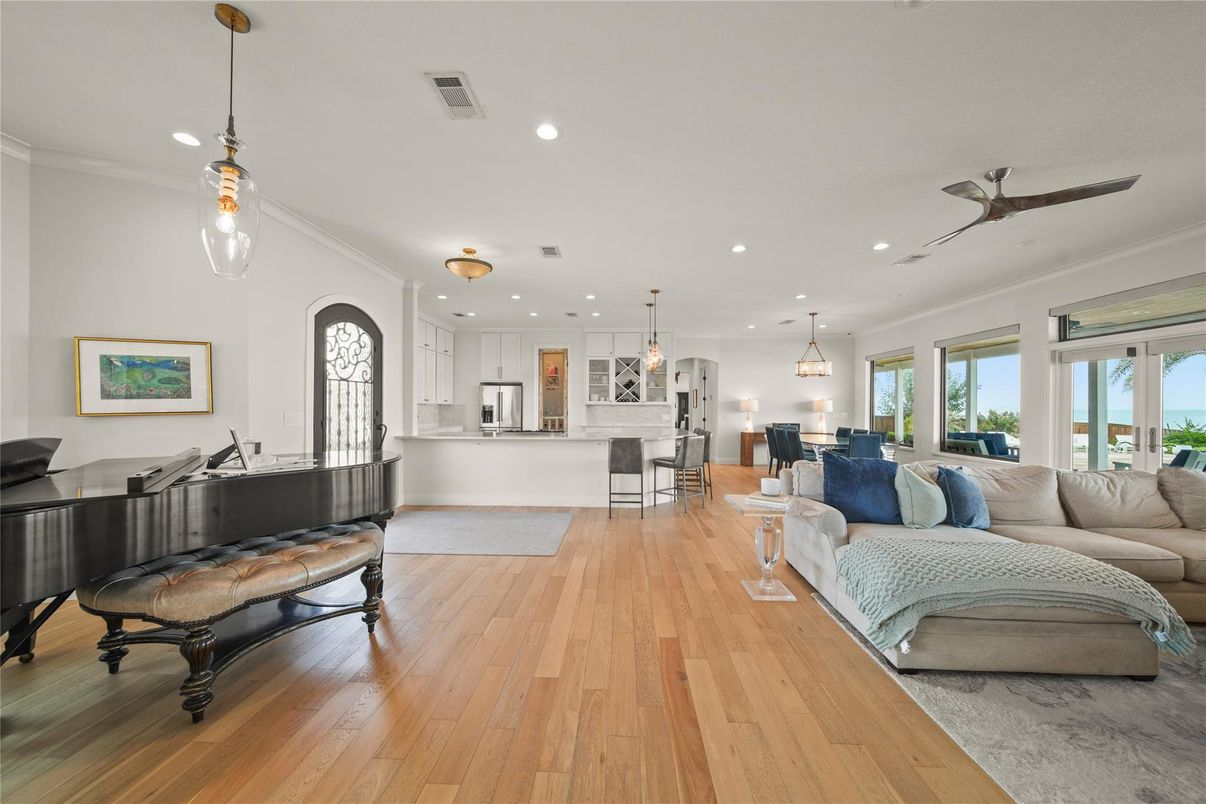 Dining room, Interior, Kitchen, Living room, Pendant Lights, Piano, Recessed Lighting, Wood Texture Flooring
