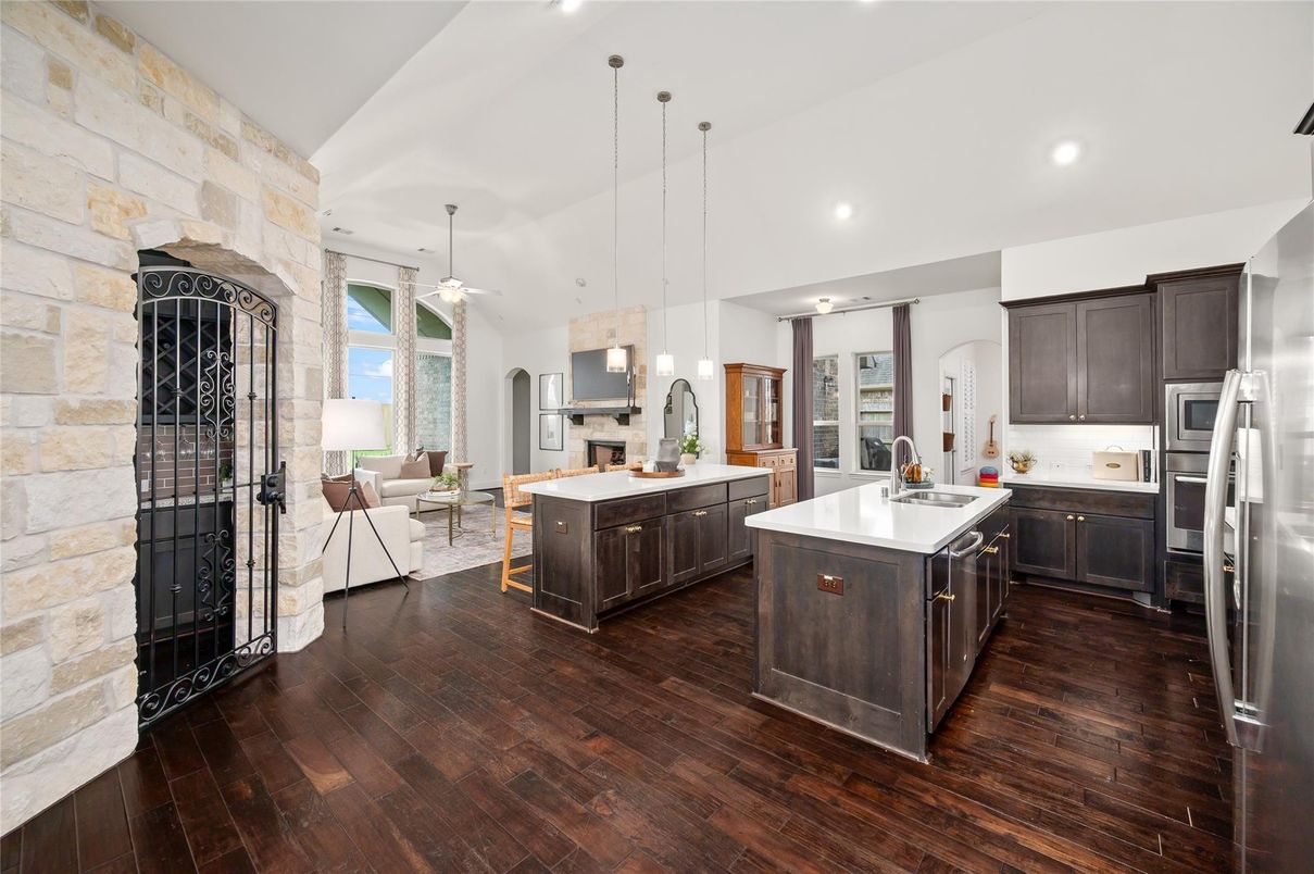 Interior, Kitchen, Pendant Lights, Recessed Lighting, Stainless Steel Appliances, Stone Walls, Wood Texture Flooring