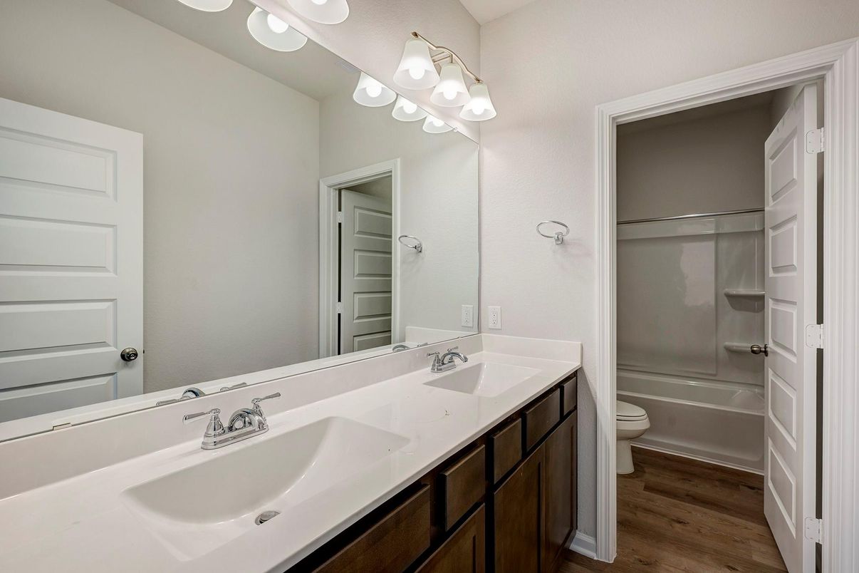 Bathroom, Dual Sink Vanities, Glass Shower, Interior, Wood Texture Flooring