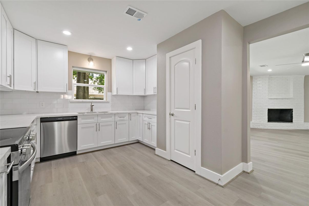 Interior, Kitchen, Recessed Lighting, Stainless Steel Appliances, Wood Texture Flooring