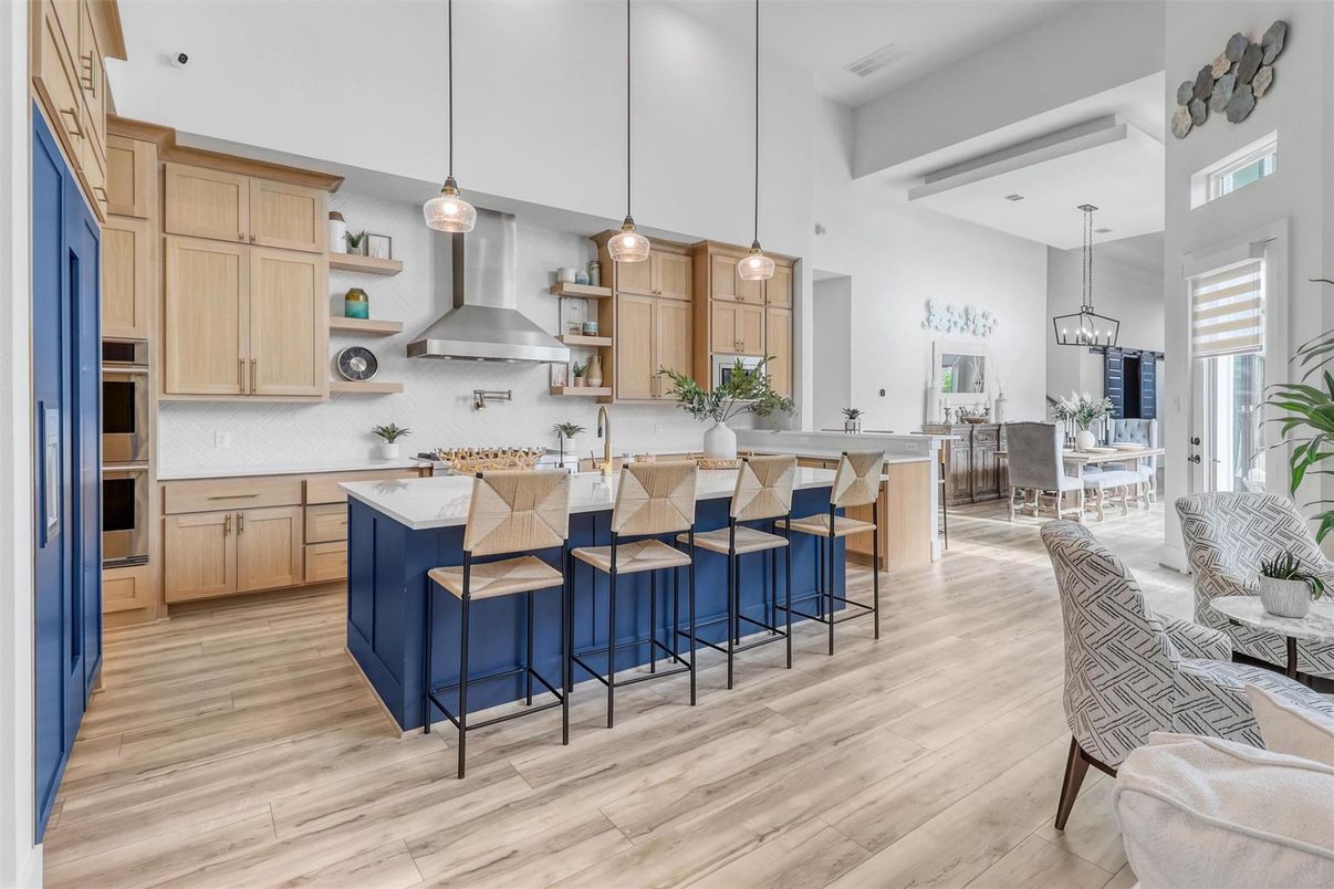 Dining room, Interior, Kitchen, Pendant Lights, Recessed Lighting, Stainless Steel Appliances, Wood Texture Flooring