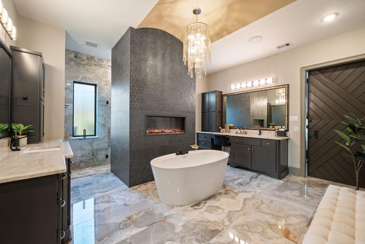 Bathroom, Chandelier, Dual Sink Vanities, Fireplace, Free Standing Baths, Interior, Marble, Pendant Lights, Recessed Lighting