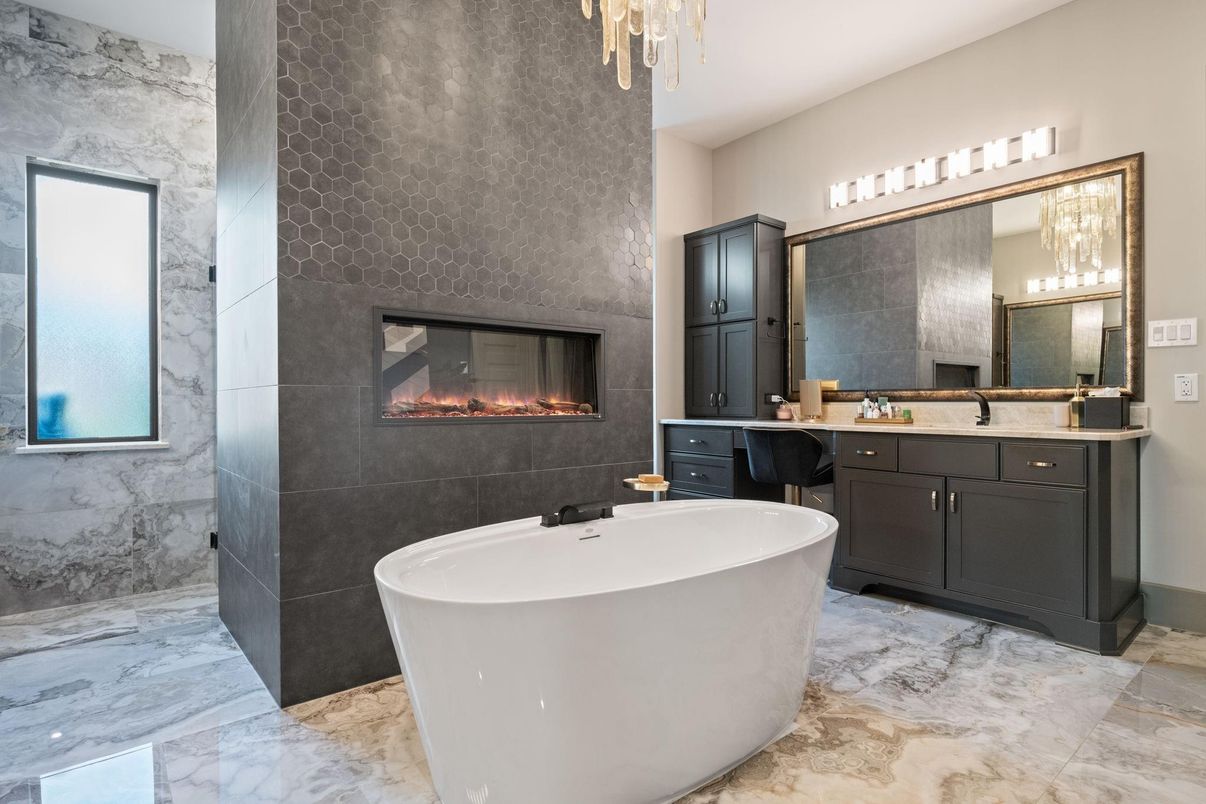 Bathroom, Chandelier, Dual Sink Vanities, Fireplace, Free Standing Baths, Interior, Marble, Marble Walls
