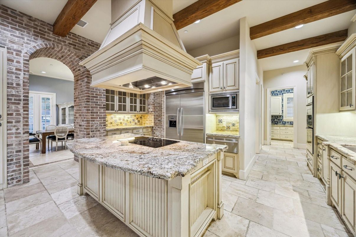 Dining room, Interior, Kitchen, Recessed Lighting, Stainless Steel Appliances, Stone Walls, Wooden Beams