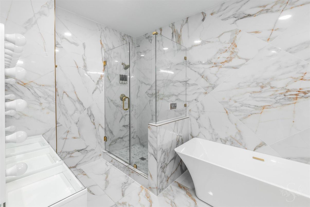 Bathroom, Free Standing Baths, Glass Shower, Interior, Marble, Marble Walls, Recessed Lighting