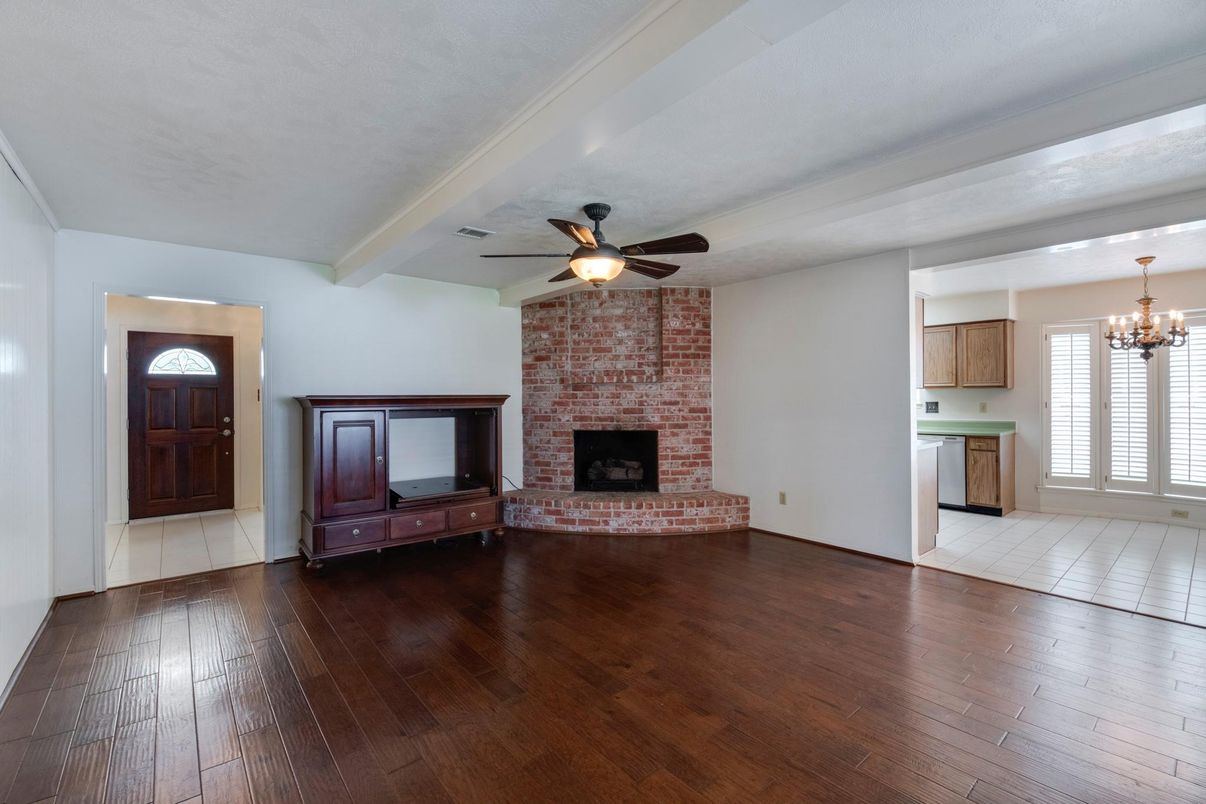 Chandelier, Empty room, Fireplace, Interior, Stone Walls, Wood Texture Flooring
