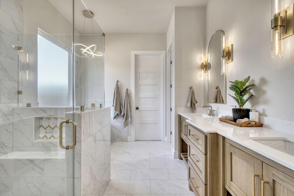 Bathroom, Dual Sink Vanities, Glass Shower, Interior, Marble, Marble Walls, Pendant Lights