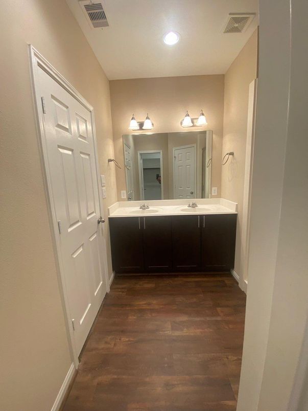 Bathroom, Dual Sink Vanities, Interior, Recessed Lighting, Wood Texture Flooring