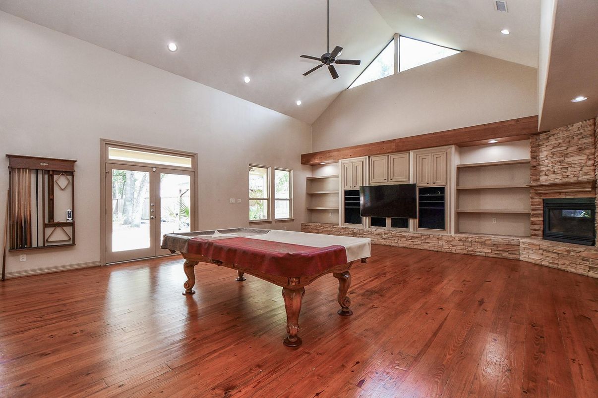 Billiard Table, Fireplace, Game Room, Interior, Recessed Lighting, Wood Texture Flooring