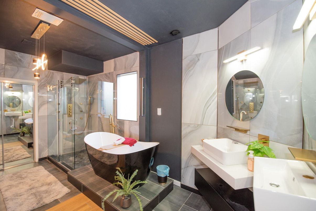 Bathroom, Free Standing Baths, Glass Shower, Interior, Marble Walls, Pendant Lights