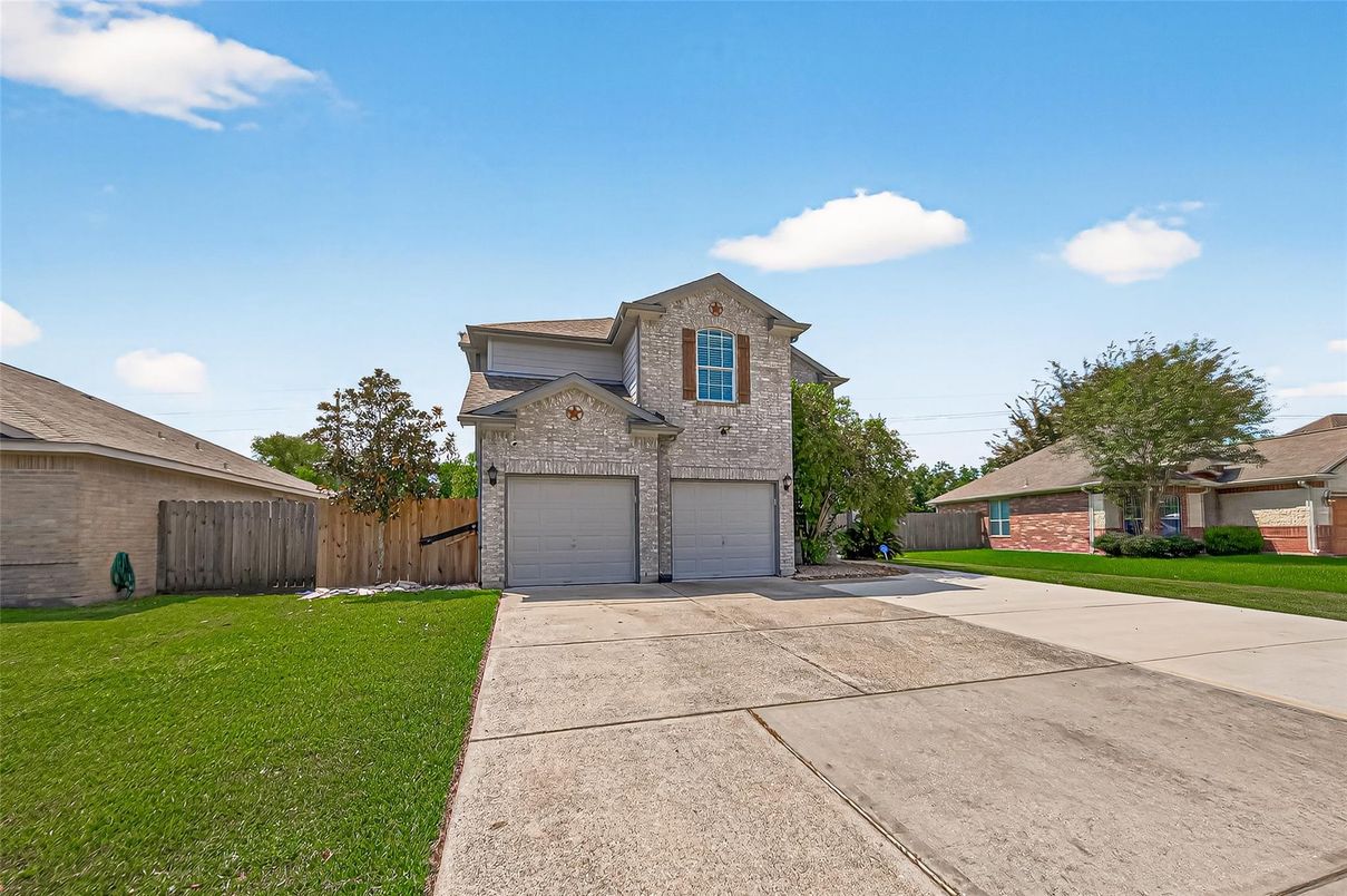 Attached, Exterior, Facade, Brick Facade, Brick Traditional