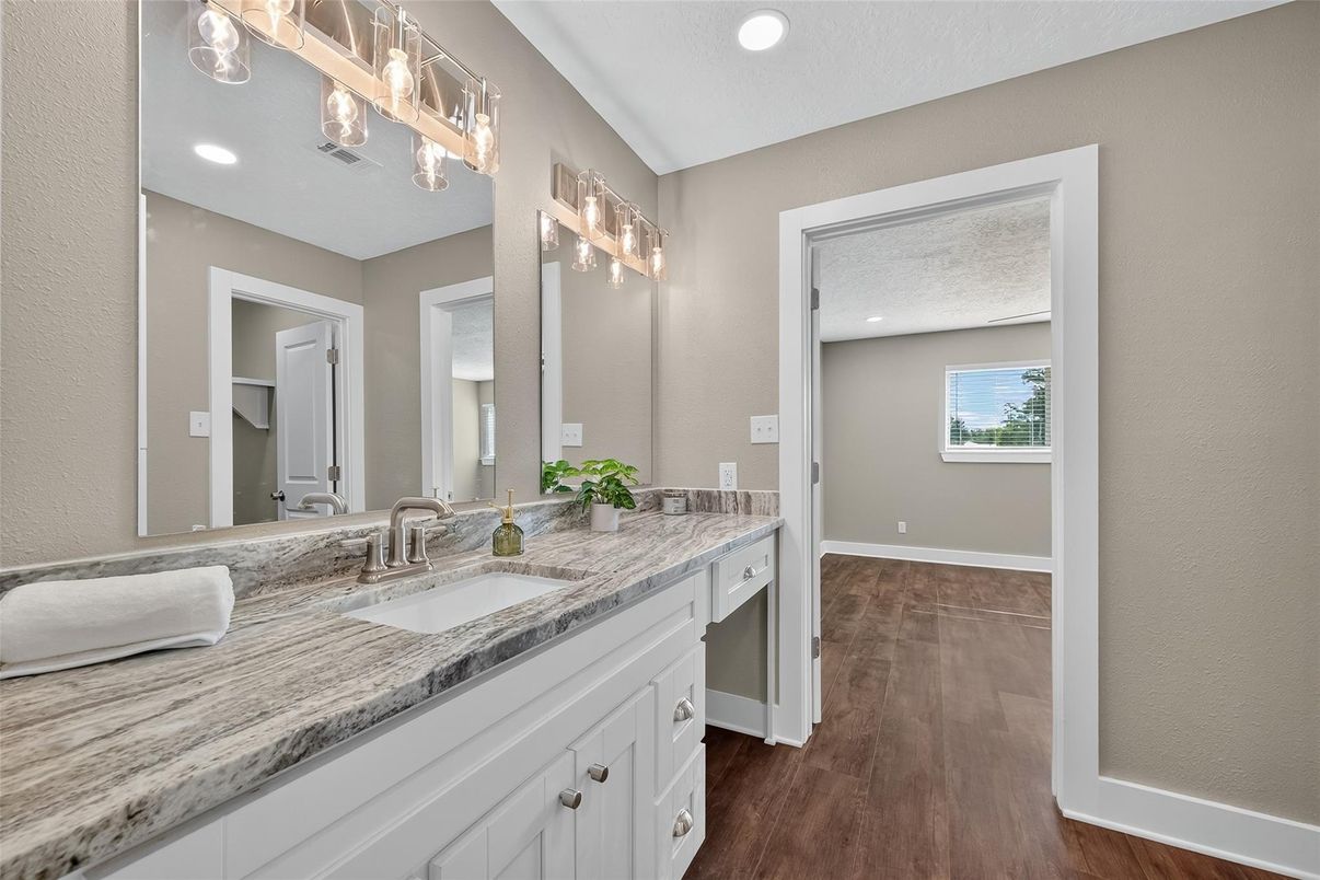 Bathroom, Dual Sink Vanities, Interior, Recessed Lighting, Wood Texture Flooring