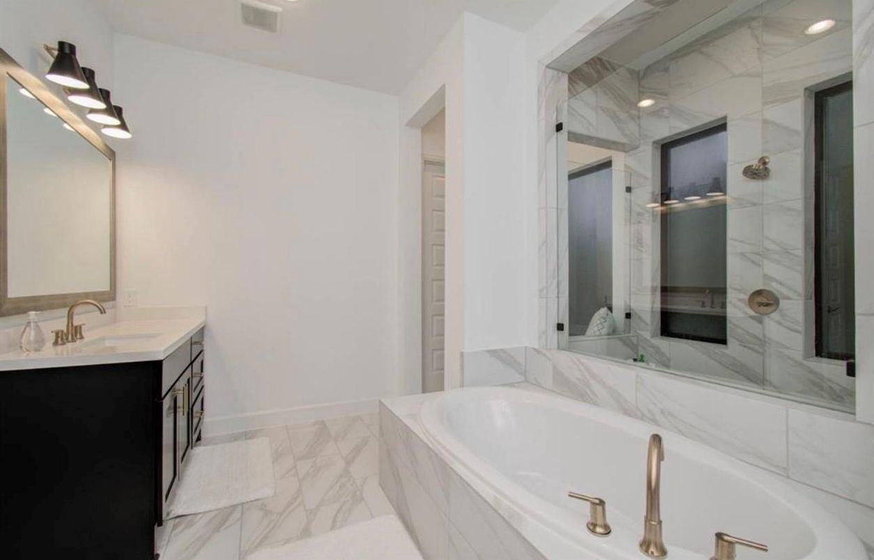 Bathroom, Dual Sink Vanities, Glass Shower, Interior, Marble, Marble Walls, Recessed Lighting