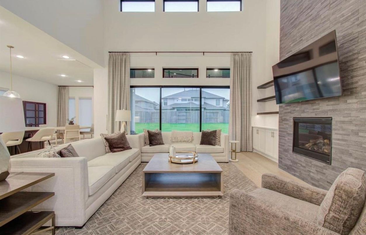Dining room, Fireplace, Interior, Living room, Pendant Lights, Recessed Lighting, Stone Walls, Wood Texture Flooring