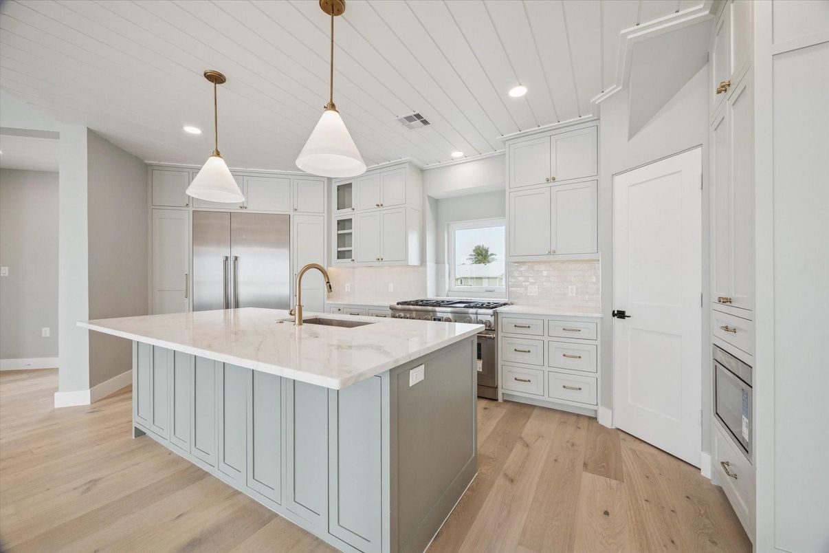 Interior, Kitchen, Pendant Lights, Recessed Lighting, Stainless Steel Appliances, Wood Texture Flooring