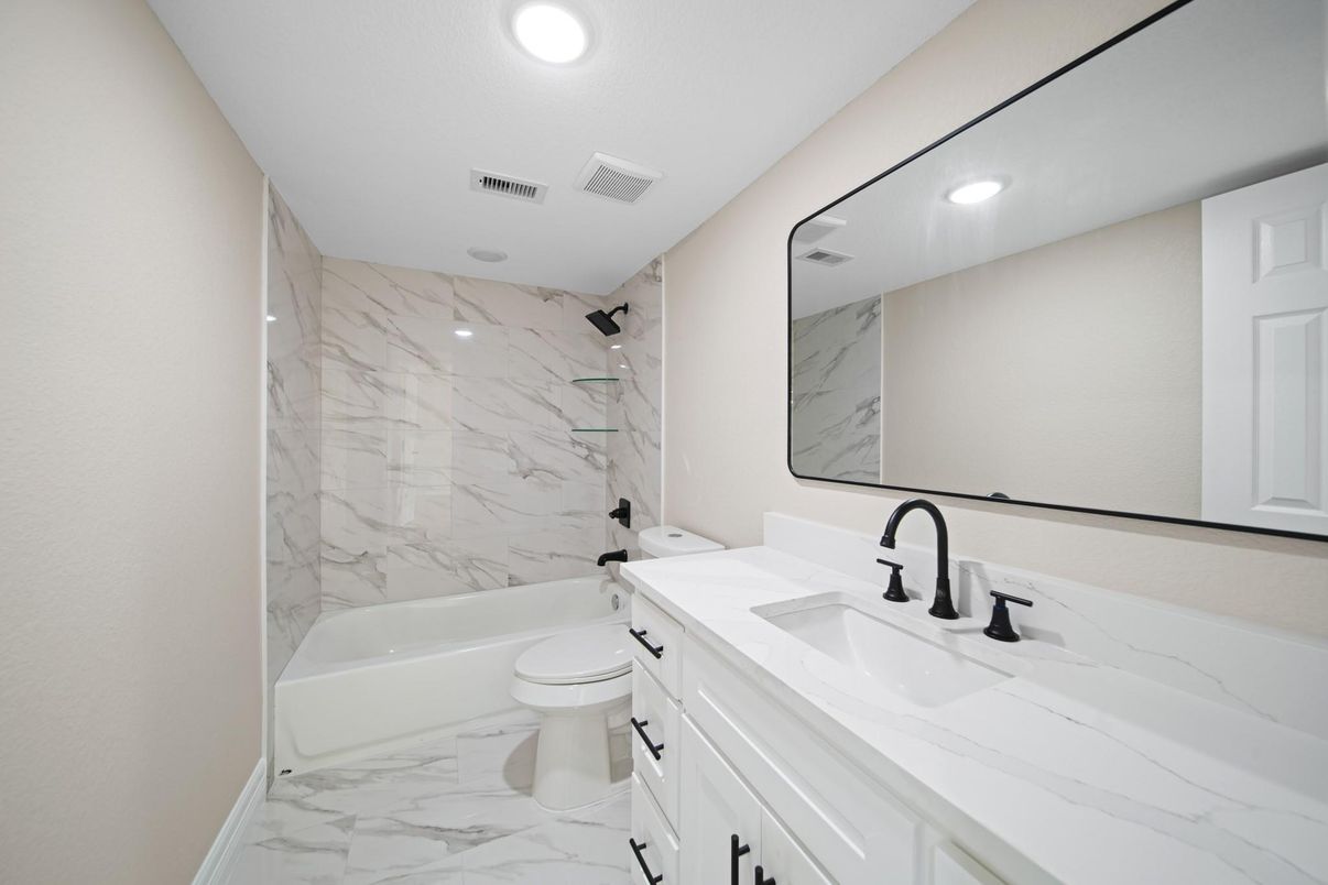 Bathroom, Dual Sink Vanities, Interior, Marble, Marble Walls, Recessed Lighting