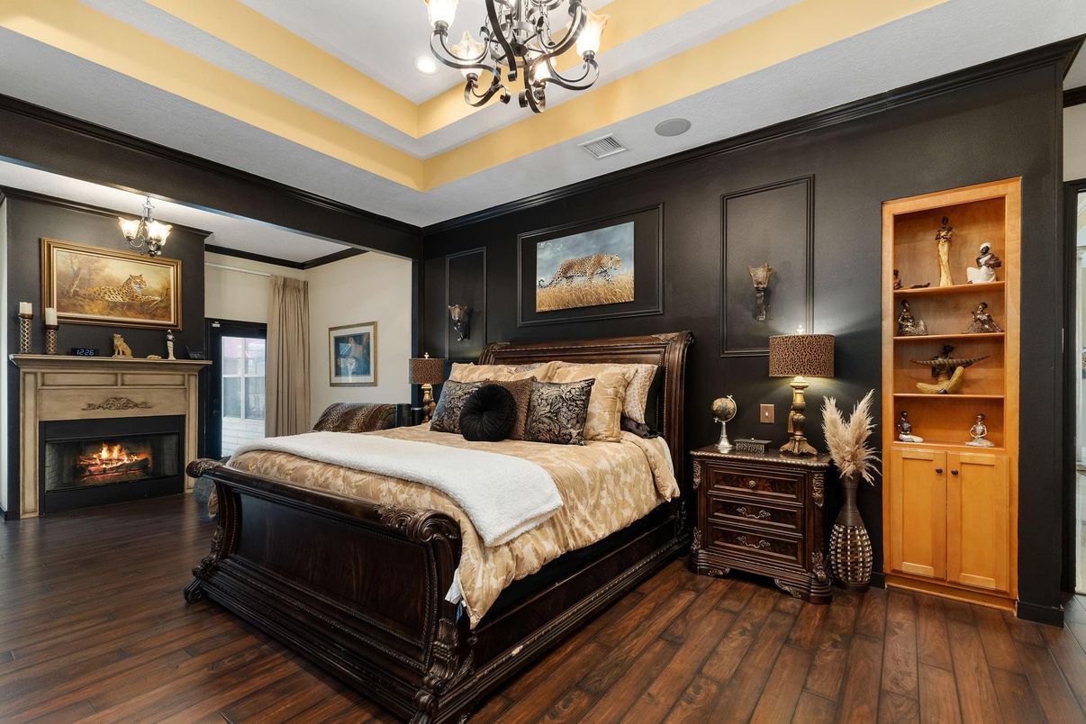 Bedroom, Chandelier, Fireplace, Interior, Pendant Lights, Wood Texture Flooring