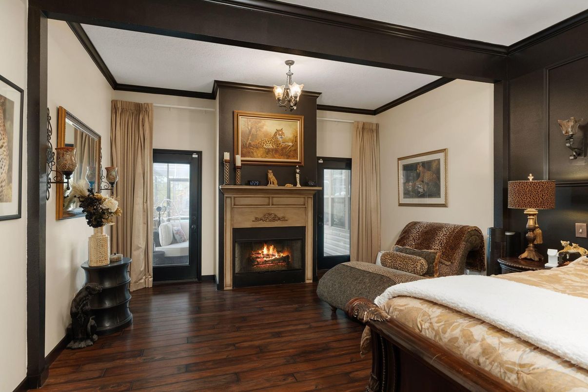 Bedroom, Chandelier, Fireplace, Interior, Wood Texture Flooring