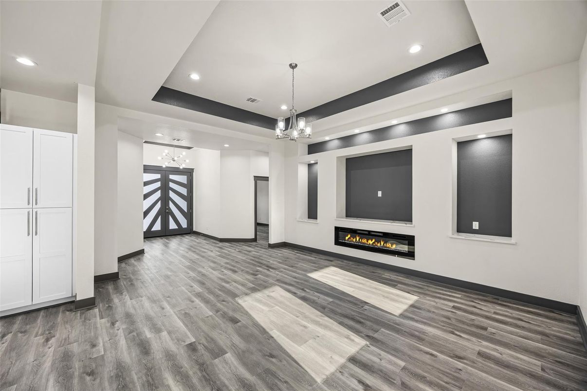 Fireplace, Interior, Pendant Lights, Recessed Lighting, Wood Texture Flooring
