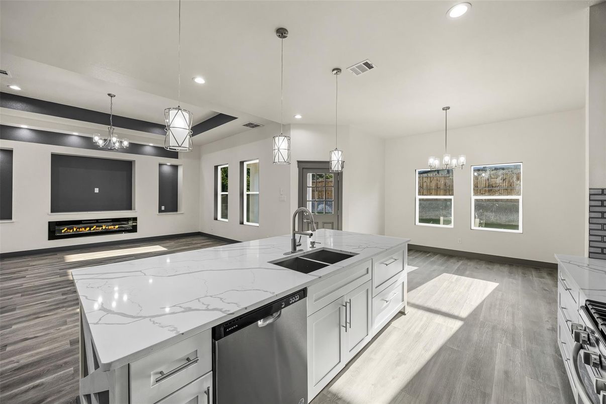 Chandelier, Fireplace, Interior, Kitchen, Pendant Lights, Recessed Lighting, Wood Texture Flooring