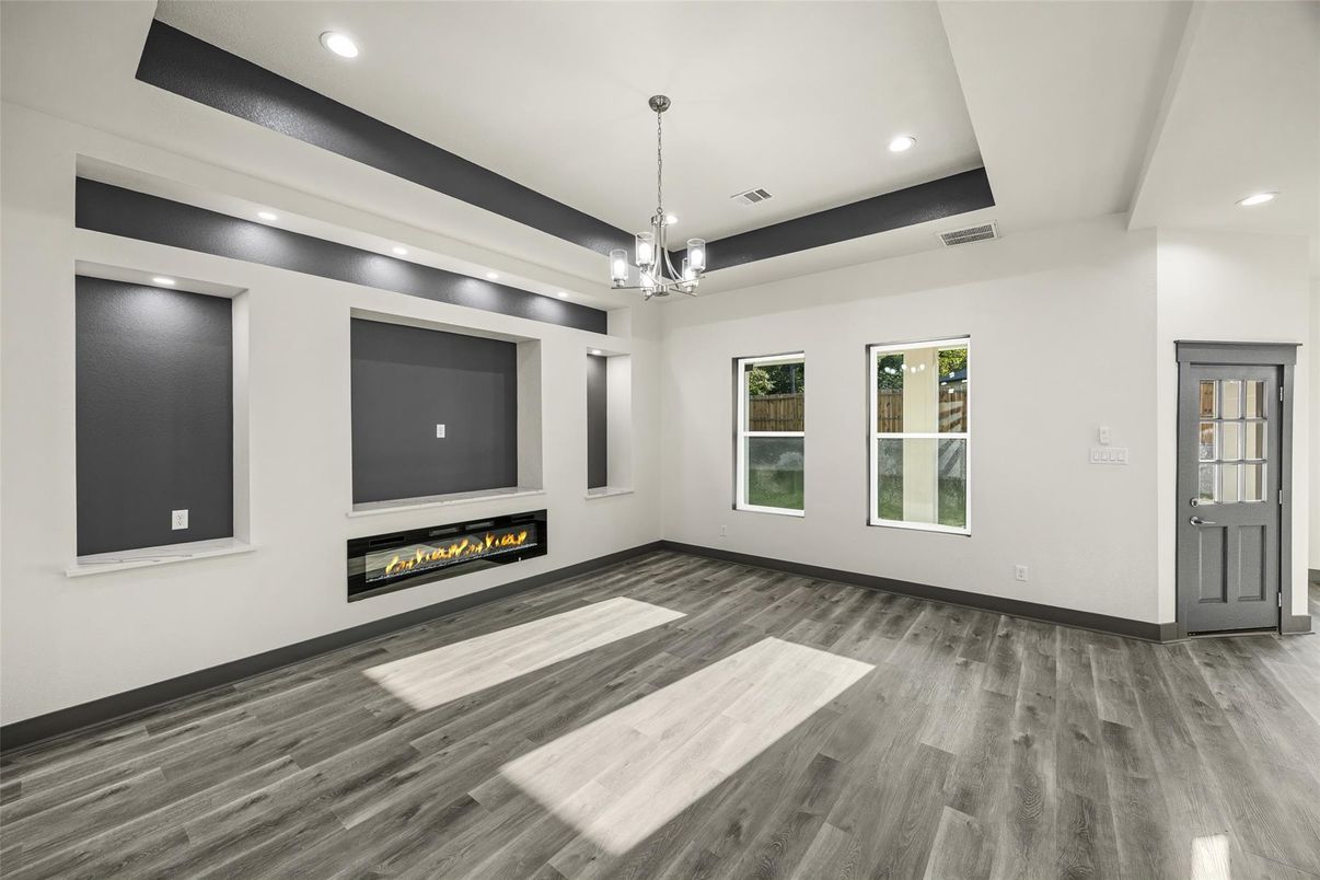 Empty room, Fireplace, Interior, Pendant Lights, Recessed Lighting, Wood Texture Flooring