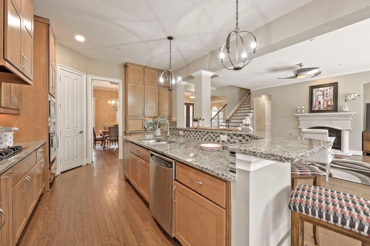 Dining room, Fireplace, Interior, Kitchen, Pendant Lights, Recessed Lighting, Wood Texture Flooring