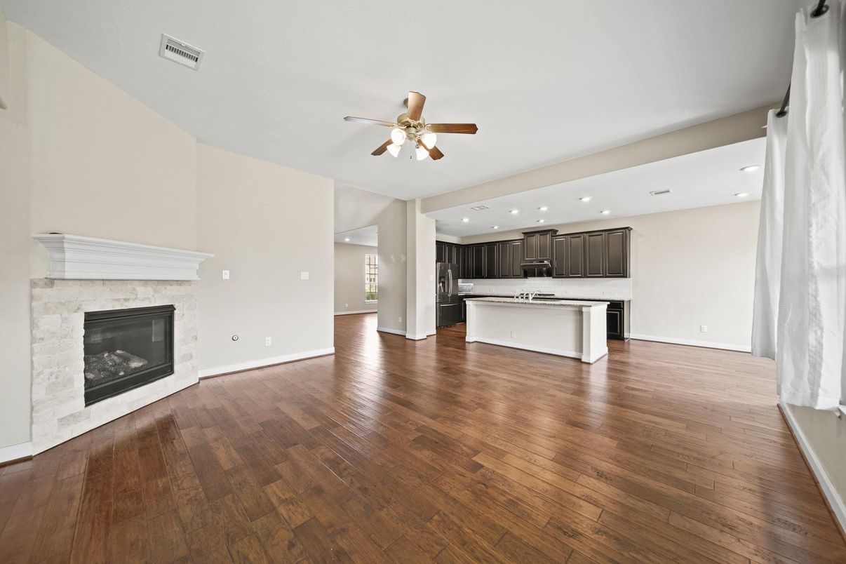 Empty room, Fireplace, Interior, Kitchen, Recessed Lighting, Wood Texture Flooring