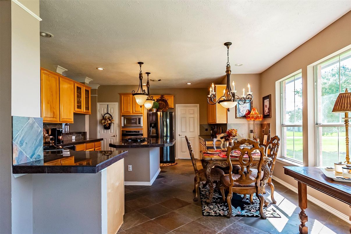 Chandelier, Dining room, Interior, Kitchen, Pendant Lights, Recessed Lighting, Stainless Steel Appliances