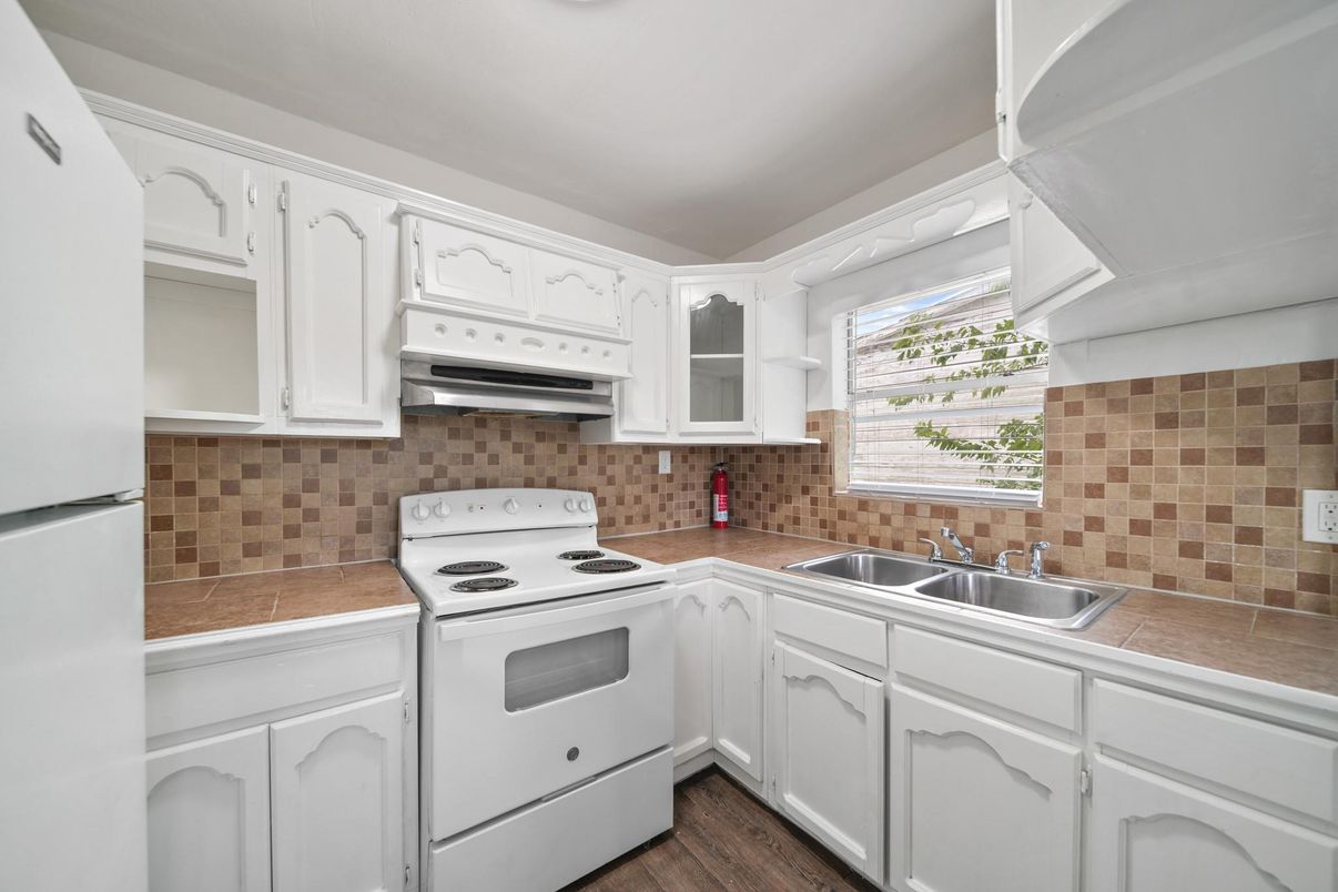 Interior, Kitchen, Tile Countertops, Wood Texture Flooring