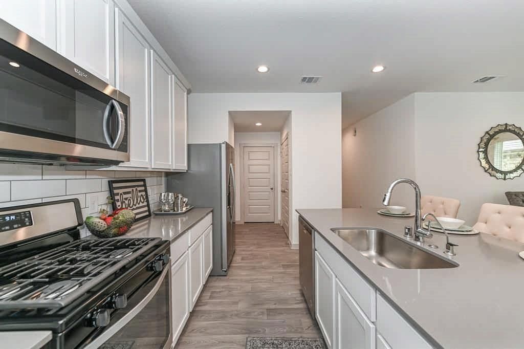 Interior, Kitchen, Recessed Lighting, Stainless Steel Appliances, Wood Texture Flooring