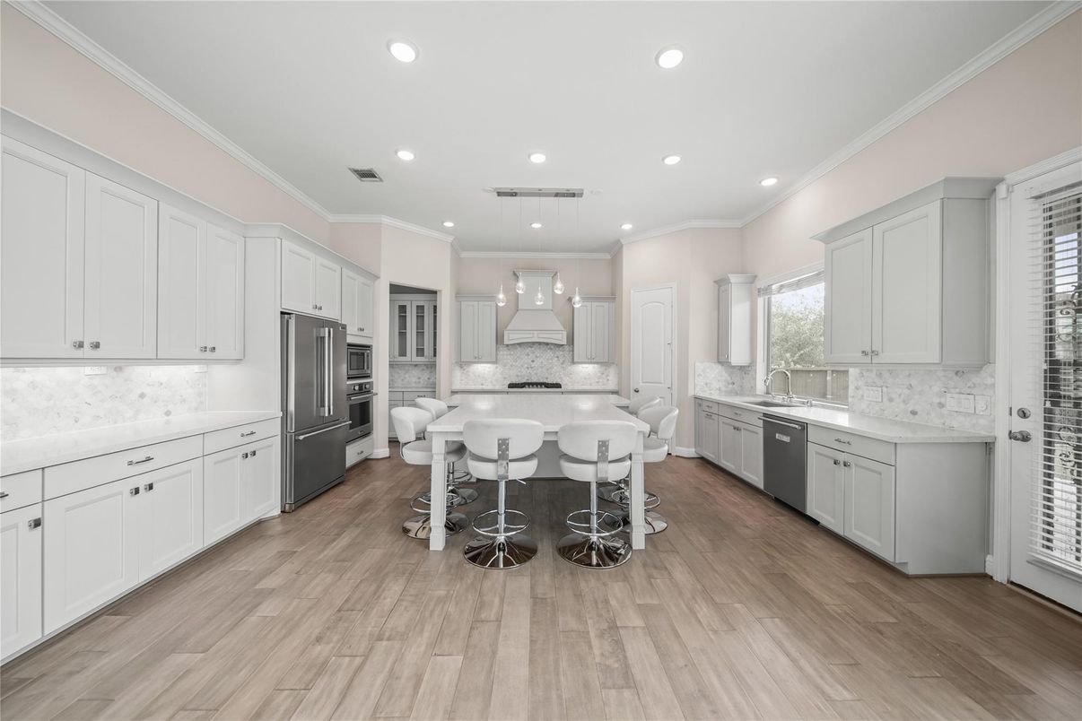 Interior, Kitchen, Pendant Lights, Recessed Lighting, Stainless Steel Appliances, Wood Texture Flooring