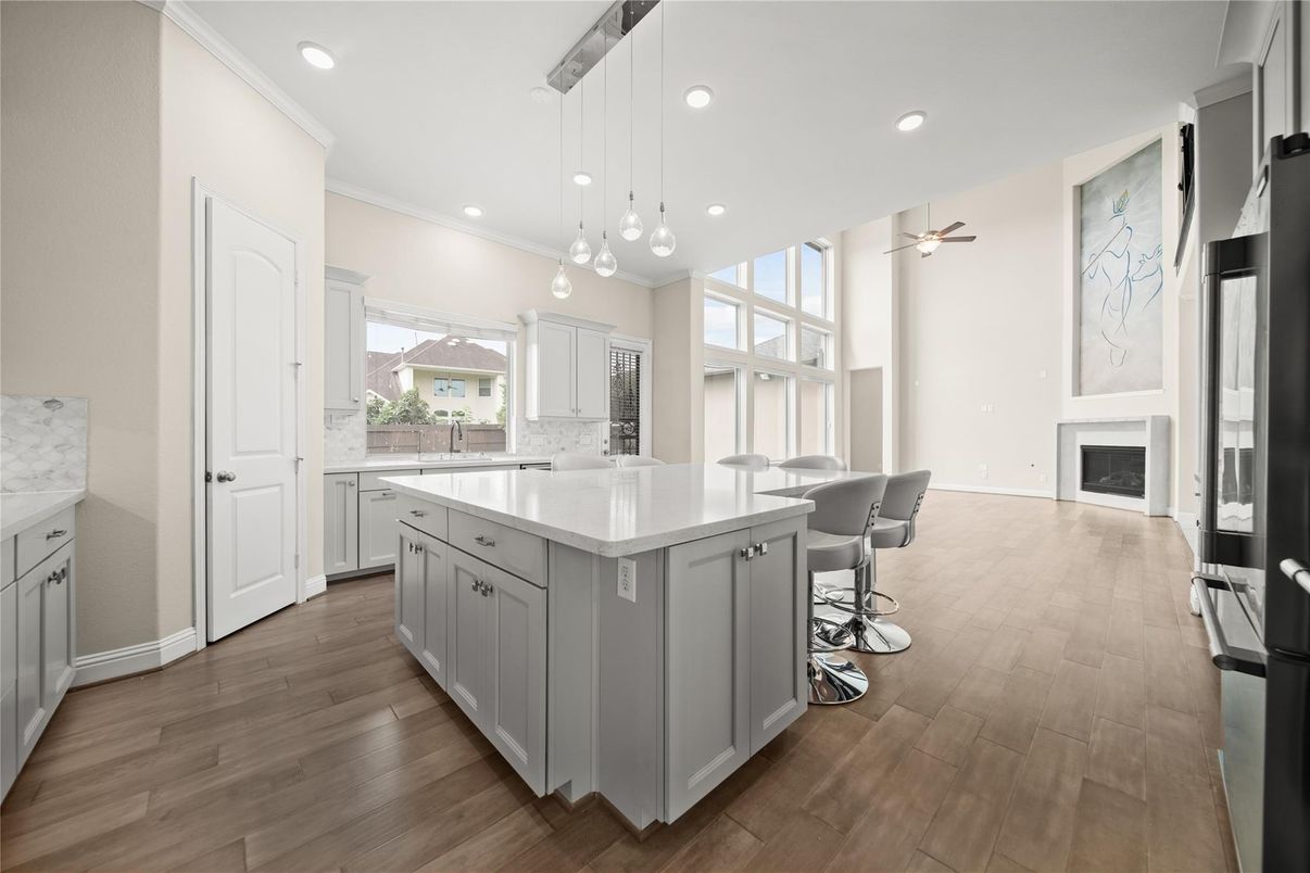 Fireplace, Interior, Kitchen, Pendant Lights, Recessed Lighting, Wood Texture Flooring