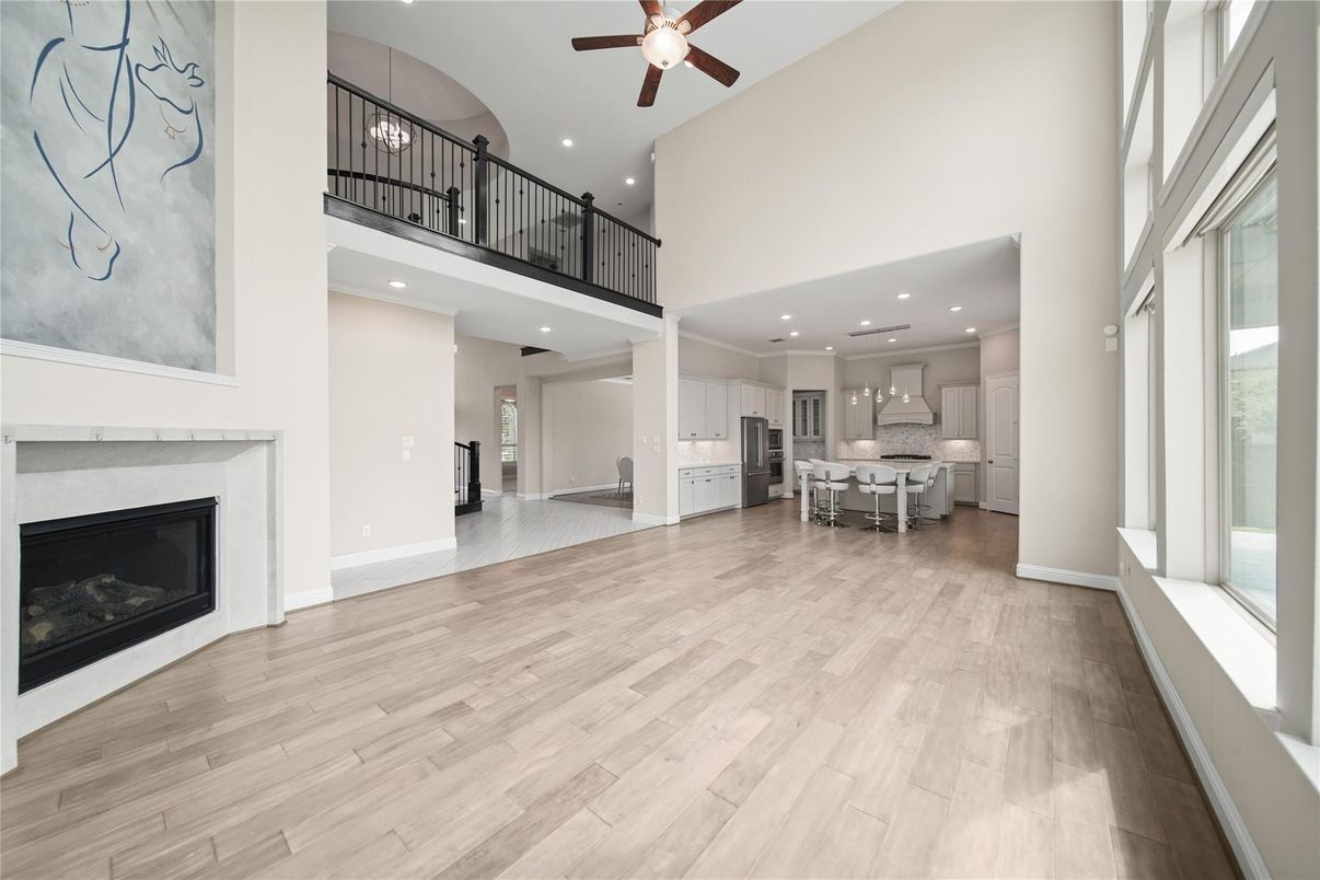 Dining room, Fireplace, Interior, Kitchen, Pendant Lights, Recessed Lighting, Wood Texture Flooring